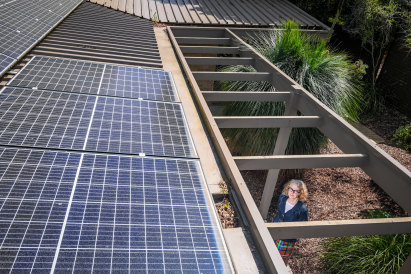 Julie Mulhauser and husband John retrofitted and electrified their home, reducing their annual bills down to $300 a year.