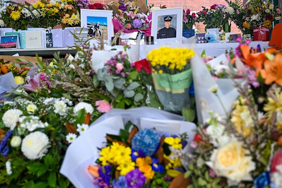 Floral tribute at the Wangaratta police station in the weeks after the shooting.