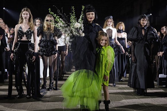 Gail Sorronda and her daughter Juniper take a bow at her 20th anniversary show ‘Chromophobia’ in Brisbane.