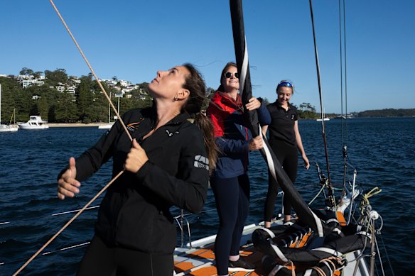 Elizabeth Tucker, Malin Ludwig and Annie Stevenson on board First Light at Middle Harbour Yacht Club.