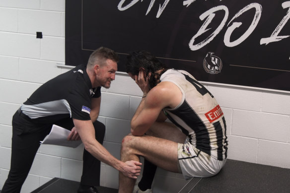 Collingwood coach Nathan Buckley consoles ruckman Brodie Grundy in From the Inside Out.