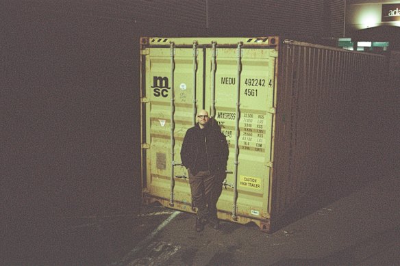 Dautovic with one of the two shipping containers in which the equipment was transported from New Zealand to Australia.