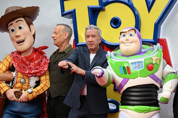 Woody, Tom Hanks, Tim Allen and Buzz Lightyear at the UK launch event for Disney and Pixar’s Toy Story 5.