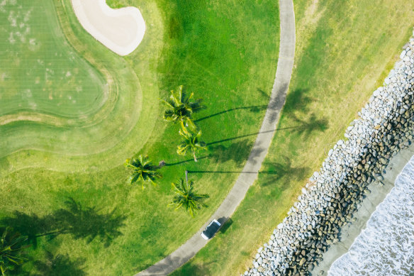 Lush fairways spilling into the ocean ... Denarau Golf Course.