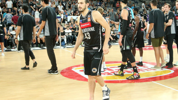 United's Chris Goulding limps off after injuring his ankle in loss to Illawarra at Hisense Arena on Sunday.