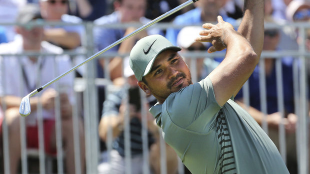Perfect preparation: Jason Day tees off.