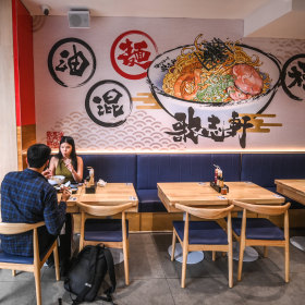 Kajiken is located in a busy train station.