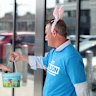 Tim Wilson was happy to don pink bunny ears and chat to people.