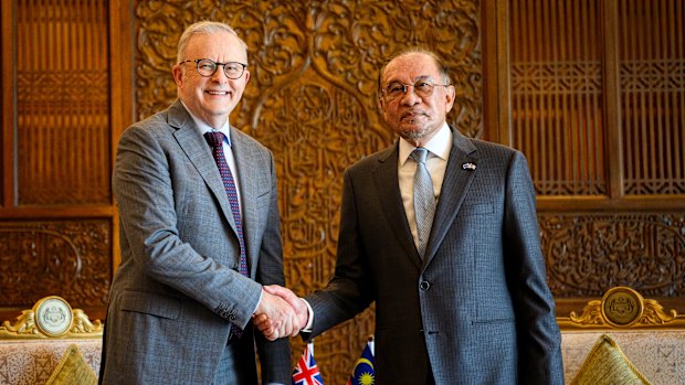 Australian Prime Minister Anthony Albanese is greeted by Malaysian Prime Minister Anwar Ibrahim ahead of a bilateral meeting at Perdana Putra Complex, in Kuala Lumpur.