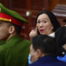 Truong My Lan, center, in court in Ho Chi Minh City.