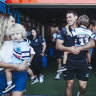 Sharks co-captain Dale Finucane with partner Madelyn Kennedy and children Tommy 2 and Freddy 4 announces he’s retiring from NRL football due to concussions at 32
