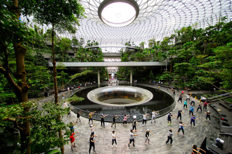 Locals practice tai chi at Singapore’s Changi Airport.