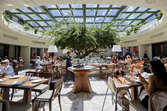 Olympus Dining’s retractable oculus glass ceiling looks like it came off the set of Dr. No.