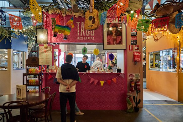 Taco Nixtamal’s colourful stall.