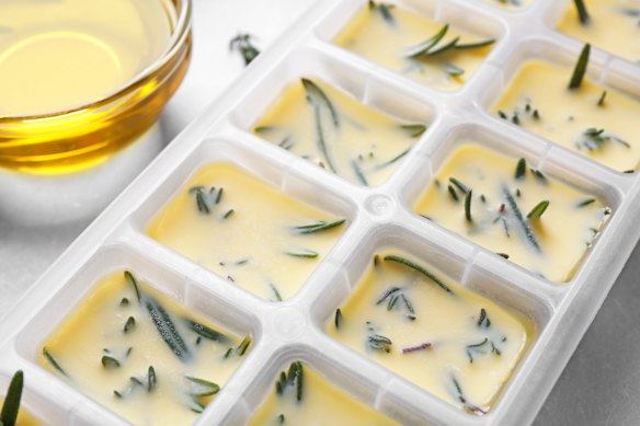 Freezing herbs in oil is a clever way to prolong their shelf life.