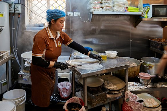 Making the rice noodles.