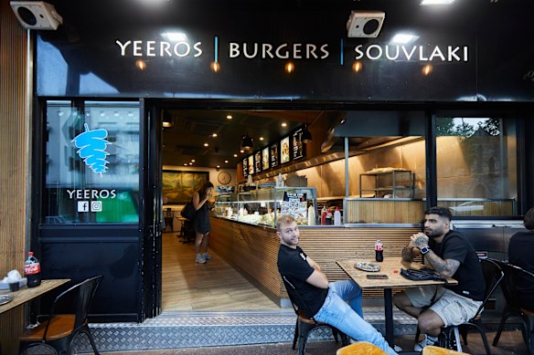 The outside tables are often full at The Yeeros Shop. 