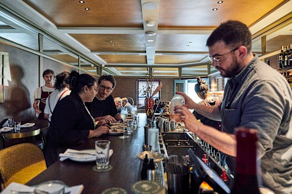 Evan Stroeve on bar duty upstairs at The Waratah.