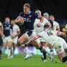 Duhan van der Merwe of Scotland goes past Freddie Steward to score his first and Scotland’s second try.
