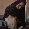 Naima Abu Ful and her two-year-old Yazan in the Shati refugee camp in Gaza City.