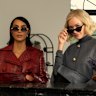 Kim Kardashian earing a vintage Jean Paul Gaultier trench coat and Naomi Watts wearing a Carolina Herrera cape in ‘All’s Fair’.