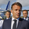French President Emmanuel Macron speaks after stepping off his plane in New Caledonia on Thursday.
