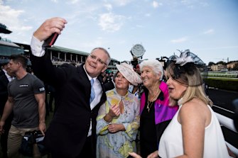 Prime Minister Scott Morrison and wife Jenny with Dawn Fraser at  Randwick Racecourse in 2019. 