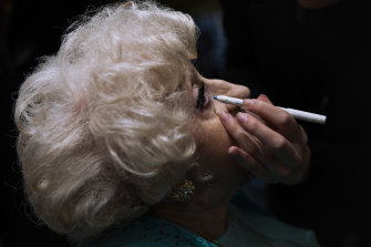 Holocaust survivor, Kuka Palmon, 87, gets make-up applied during a special beauty pageant honouring Holocaust survivors in Jerusalem. 