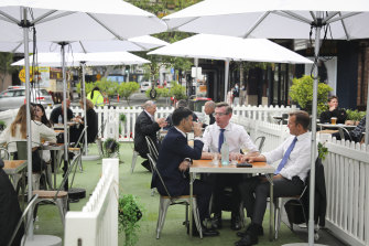 Government ministers Victor Dominello, Dominic Perrottet and Rob Stokes launch the al fresco dining pilot in October 2020.