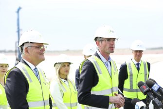 Prime Minister Scott Morrison and NSW Premier Dominic Perrottet during a visit to the Western Sydney Airport construction site on November 19, 2021.