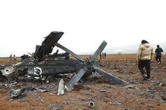 A wreckage of an American helicopter in Syria after the raid on the IS leader’s home.