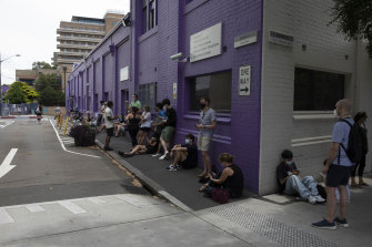 People queue for COVID-19 testing at Royal Prince Alfred Hospital in Camperdown on Boxing Day. 