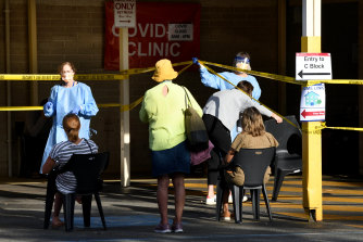 Lining up for a "fever clinic" at Sir Charles Gairdner hospital in Perth.