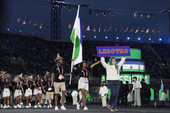 The athletes of Lesotho enter the stadium during the Commo<em></em>nwealth Games opening ceremony at the Alexander stadium in Birmingham.