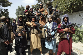Taliban fighters pictured in Kabul on Thursday.