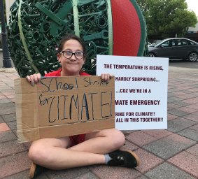 Four hours west of Brisbane, schoolgirl Ariel Ehlers stages her own climate strike. 