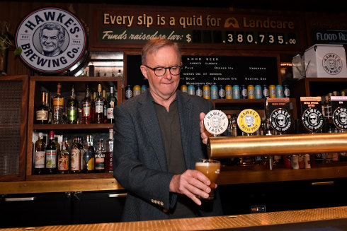 Prime Minister Anthony Albanese pours a beer during a visit to the Bob Hawke Beer & Leisure Centre in Marrickville.