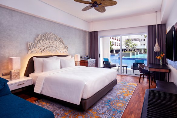 Some of the rooms open directly to a pool.