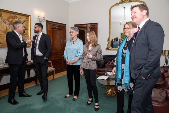 A collection of the Australians who will be attending Saturday. From left, Adam Hills, Dr Daniel Nour, Professor Merryn Voysey, Leanne Benjamin, Yvonne Kenny and Corporal Daniel Keirghan.