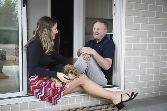 Business Western Sydney’s David Borger, seen with daughter Grace and dog Bleeker at their Parramatta home, said western Sydney was treated differently during lockdown.