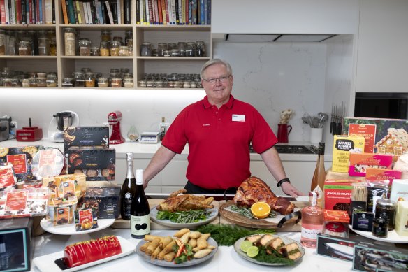 Outgoing Coles boss Steven Cain with a variety of the supermarket’s own brand items in 2021.