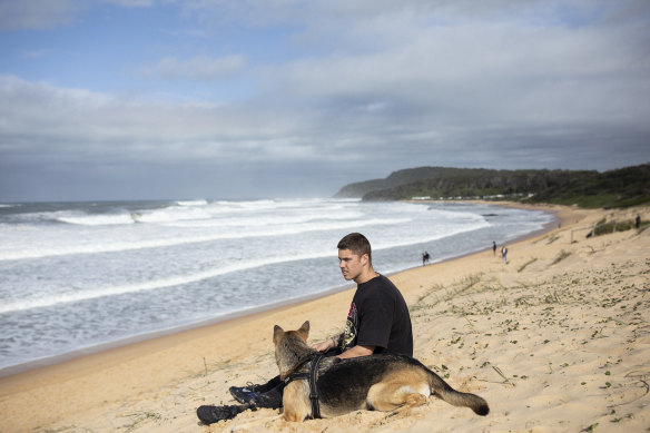 Corbin Dal Walters with his dog Stormy at his favourite surf spot at Shelley beach the day prior to his  Enlistment Ceremony.