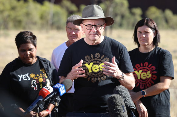 Anthony Albanese campaigning for the Voice at Uluru, flanked by Labor MP Marion Scrymgour, ultra-marathon runner and former Liberal MP Pat Farmer and NT Chief Minister Natasha Fyles.