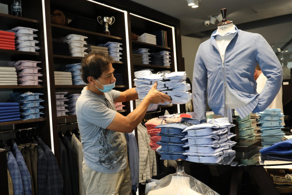 An employee of the Spada clothing store in Rome preparing for Monday's reopening. Italy was the first country to impose a nationwide lockdown to stem the flow of coronavirus.
