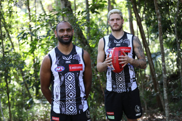 Collingwood's Travis Varcoe and Jack Crisp showcase their Indigenous round guernsey. 