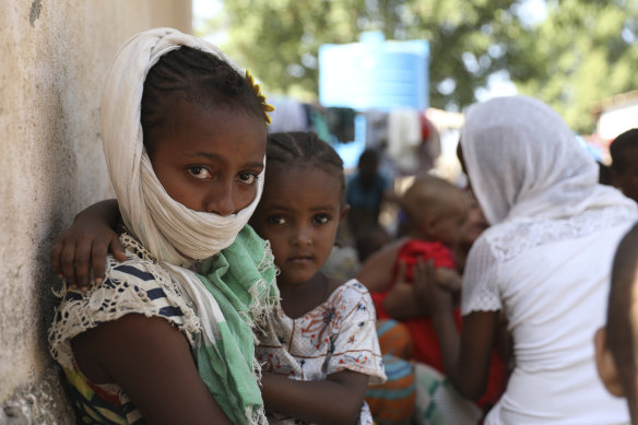 Refugees from the Tigray region of Ethiopia region wait to register at the UNCHR centre at Hamdayet, Sudan on Saturday, November 14, 2020.  