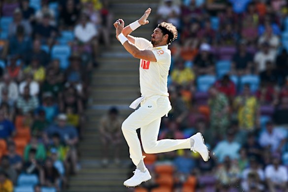 Mitchell Starc of Australia bowls on day one.