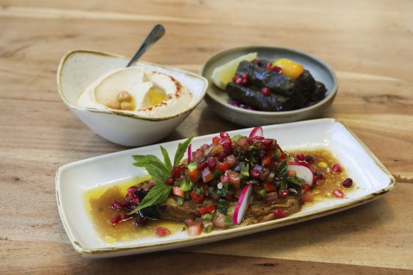 Rahib batenjan (roasted eggplant), hommos and vine leaves at Al Aseed.