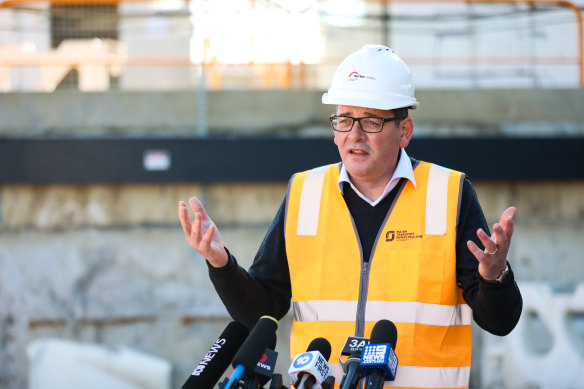 Lock out, not down: Premier Daniel Andrews wants to reduce international arrivals by at least 75 per cent.