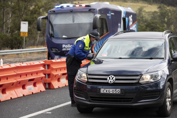 A police checkpoint at Genoa on the Victorian border on Wednesday.